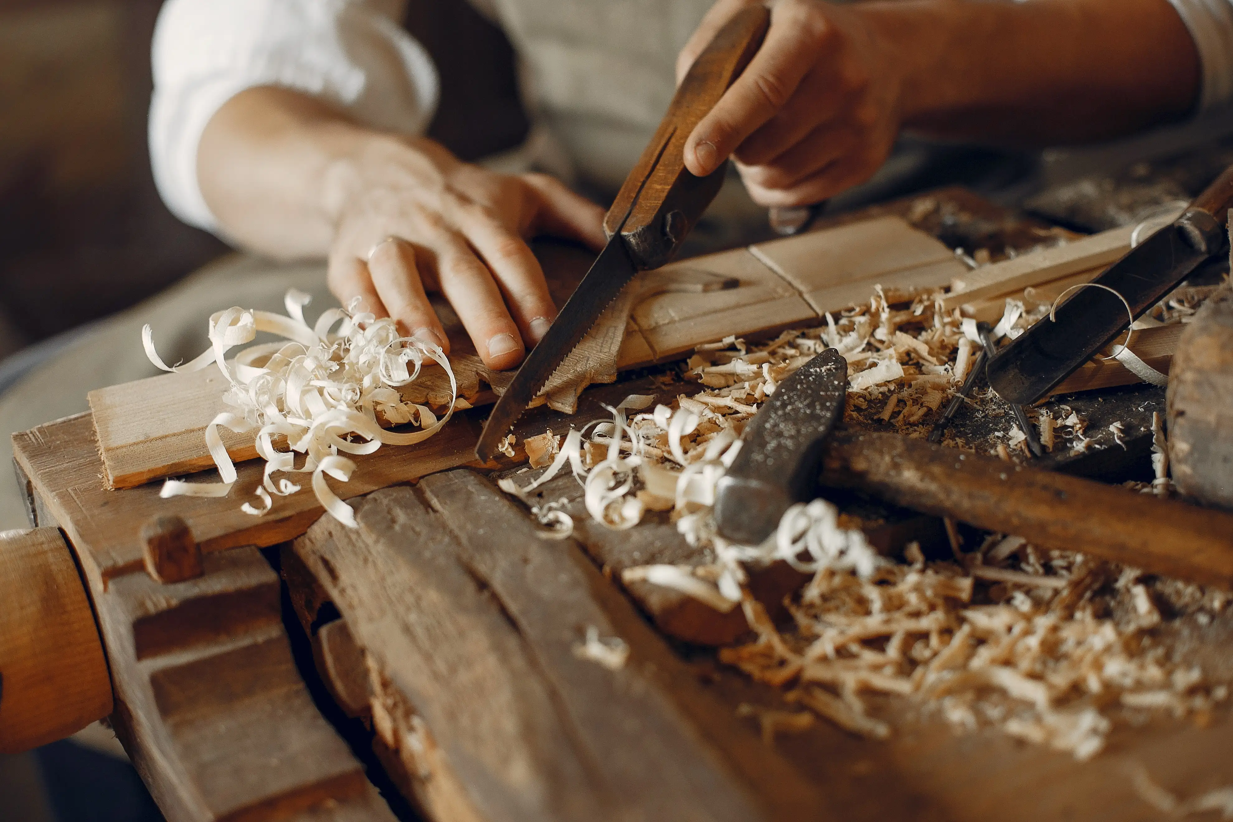 Acr Traders craftsman at work in a sunlit workshop